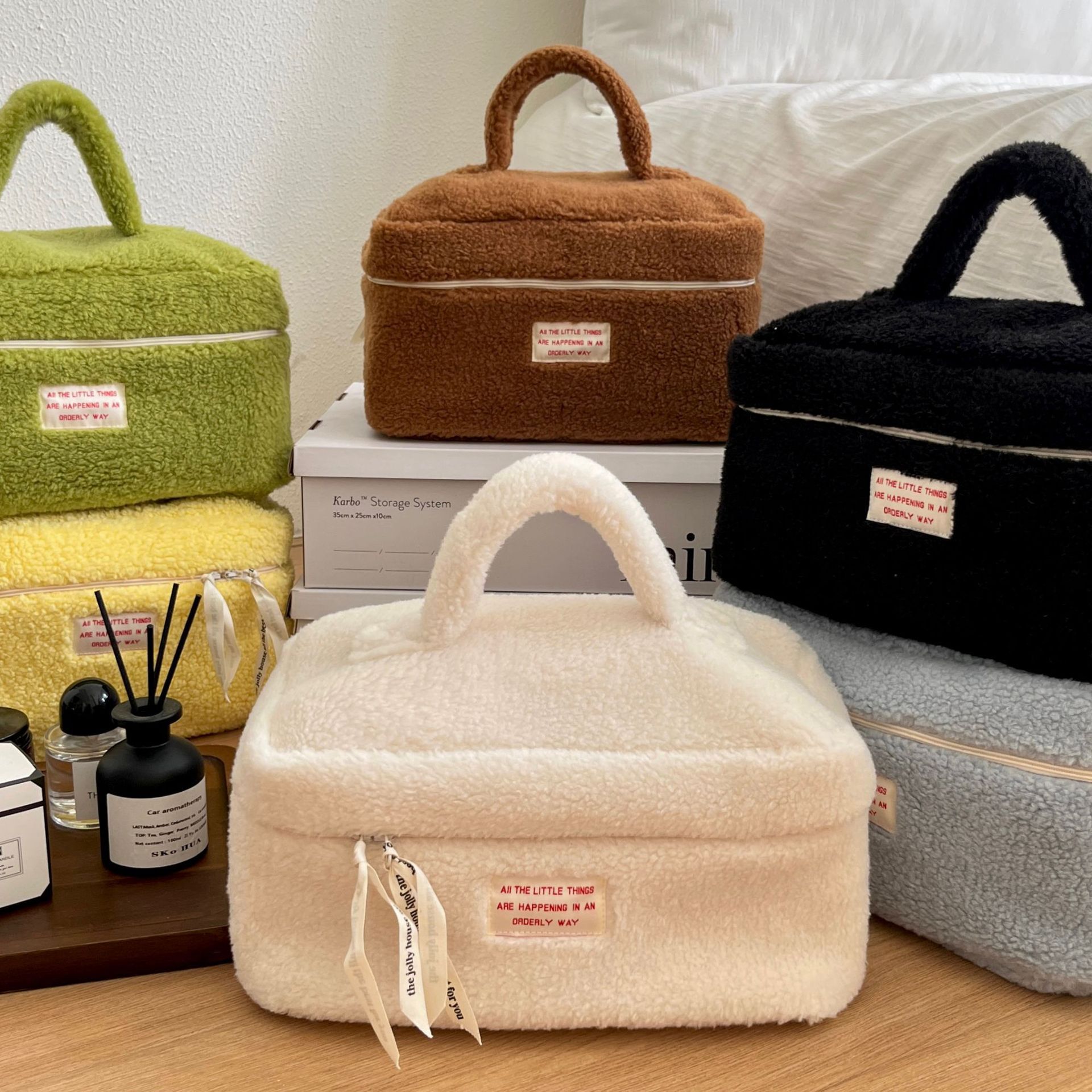 Fluffy and cute makeup bag, Japanese-style simple hand-held toiletry bag, large-capacity portable travel skin care product storage bag Application Scenario
