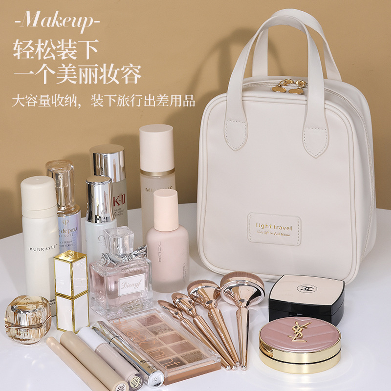New shell hand-held makeup bag, large-capacity travel storage bag, high appearance level portable cosmetics and toiletries storage bag Application Scenario