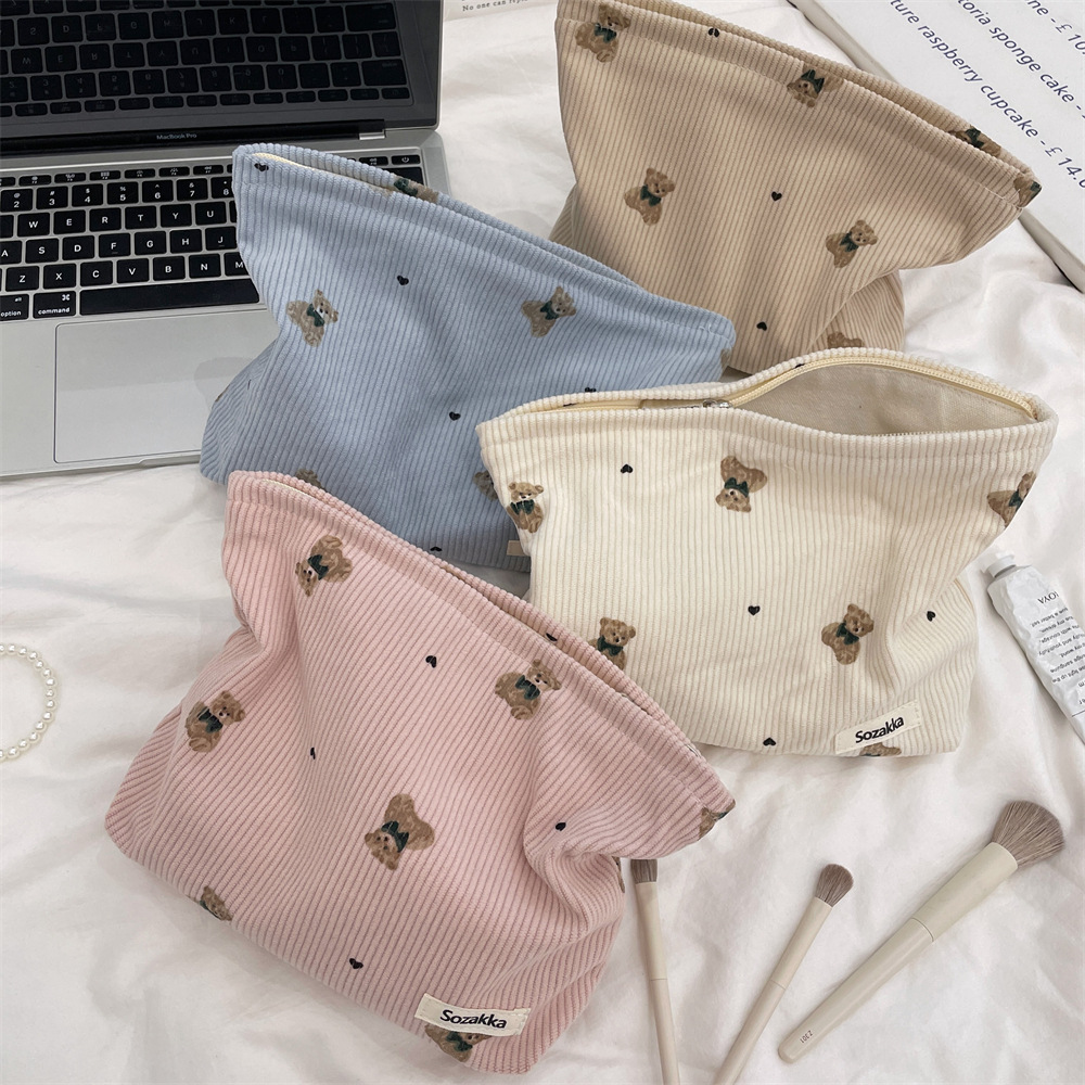 The 49192 copyrighted autumn and winter new cute bear corduroy cosmetic bag is now paired with a bag storage bag full figure