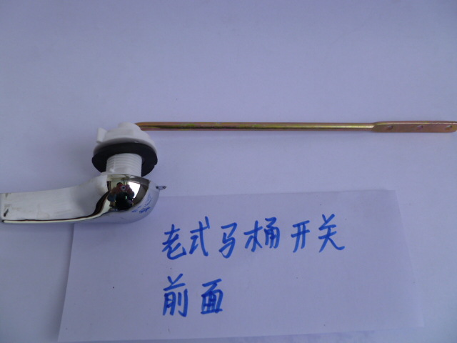 The split front and side parts of the old-fashioned flush toilet tank are equipped with a bend handle for the drain switch details Picture