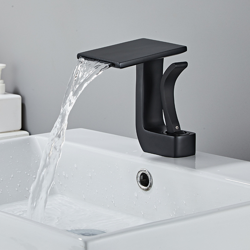 The manufacturer supplies new types of washbasins, hot and cold water faucets, copper body, waterfall water outlet, bathroom washbasins, single-hole bathroom products for wholesale full figure