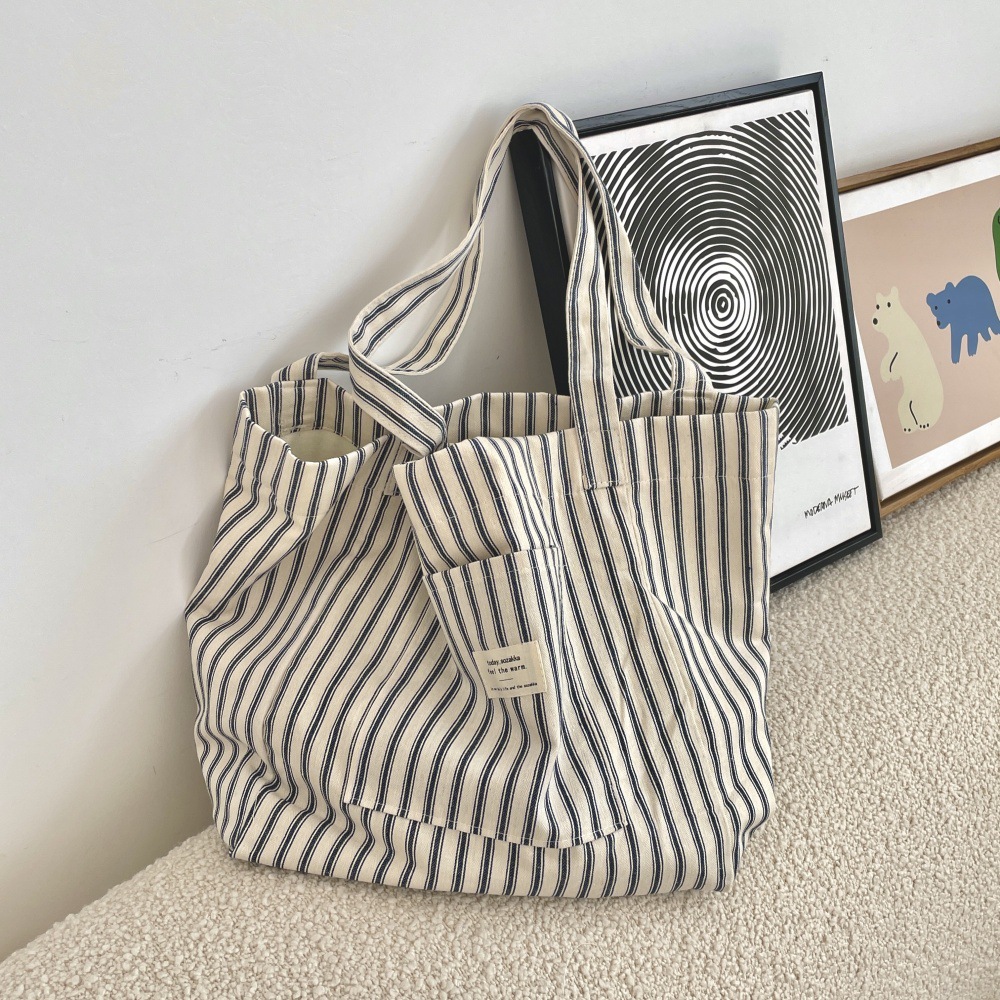 The 4891 Holiday French striped canvas bag is a versatile shopping bag with a large capacity for shopping. It is a lightweight single-shoulder bag for women's commuting Specification drawing