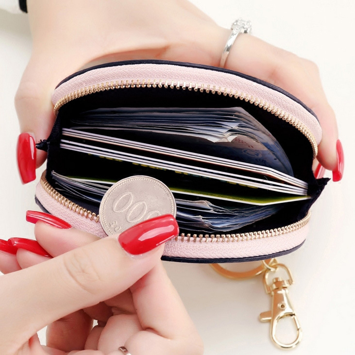This is a high-end, stylish, cute mini hand-held zipper pocket for women. It can be carried around with a cat wallet for storage Specification drawing