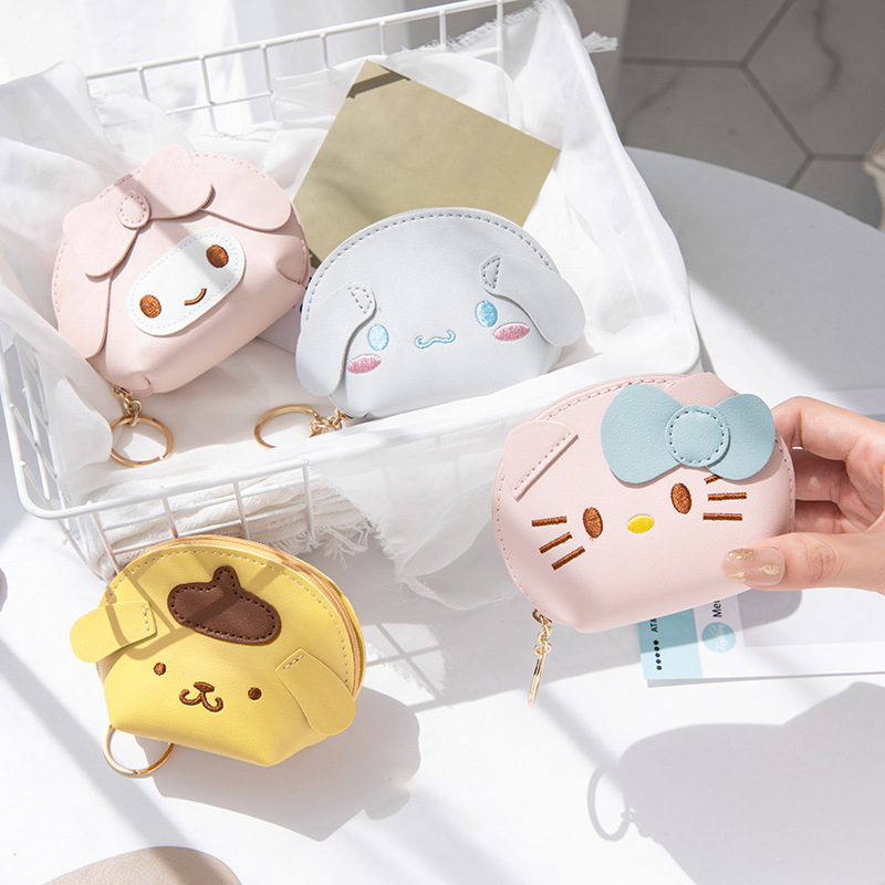 This is a cute and stylish Korean mini mini wallet with a zipper that is easy to store and has a high level of appearance. It is a cartoon wallet pendant full figure
