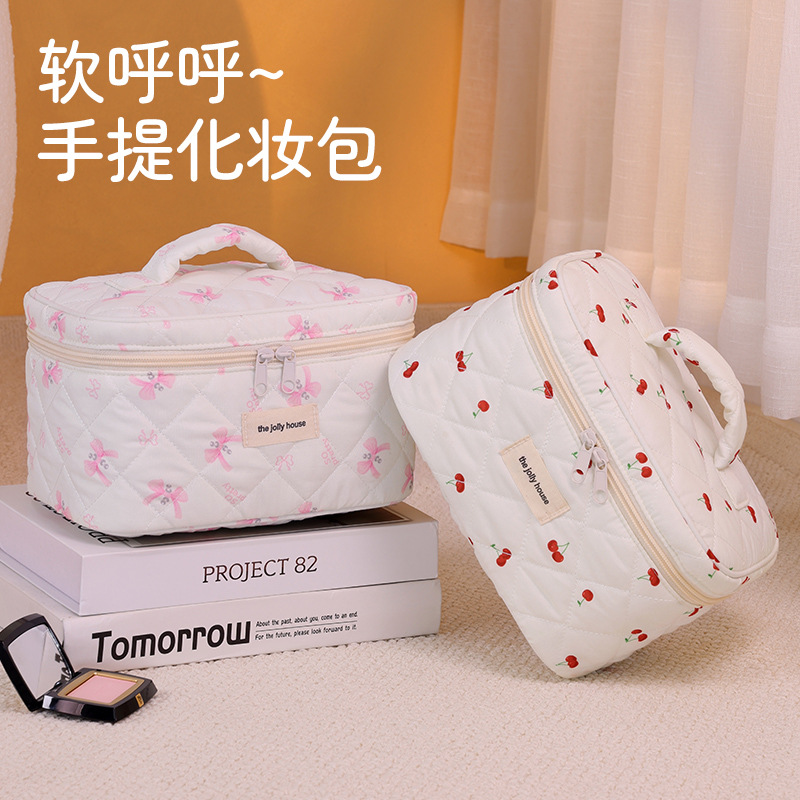 A new cross-border Amazon cream-style soft and cute bow makeup bag with large capacity and high appearance level, a girlish makeup bag Application Scenario