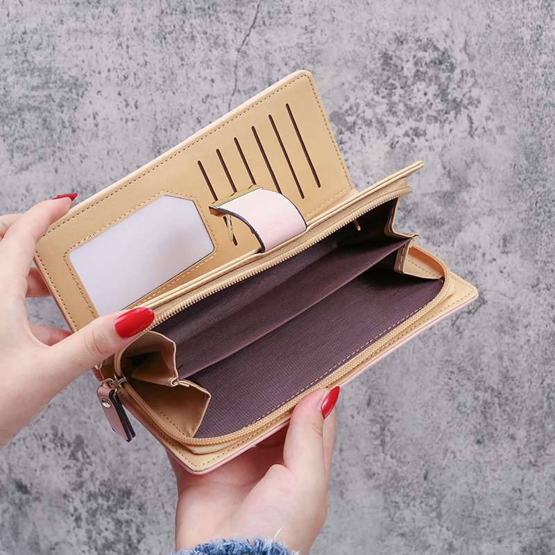 2021 New Korean-style women's wallet, long and fashionable clutch bag, hollowed-out leaf zipper buckle women's bag storage details Picture