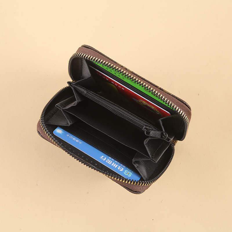 A short Korean version of a lady's wallet with old PU patterns, multiple slots, charming and small zipper wallet LOGO details Picture