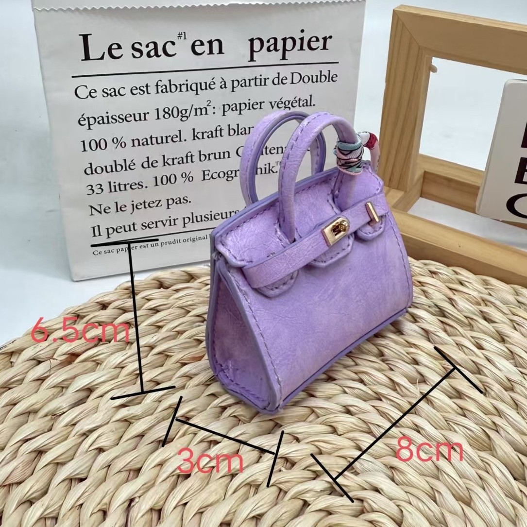 Pure color enchanted platinum bag pendant earphone case key bag Item Picture