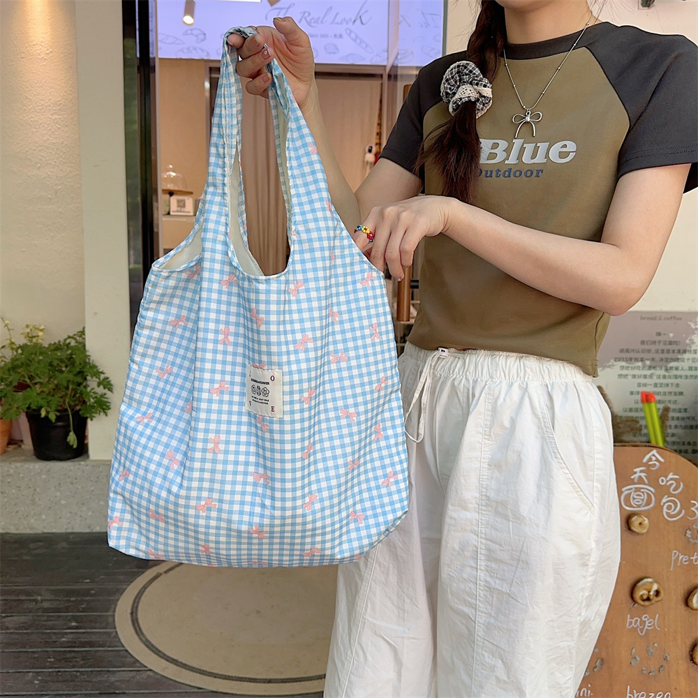 44301 large-capacity simple printed bow canvas bag, single-shoulder bag, open women's shopping bag for shopping, vest bag Application Scenario