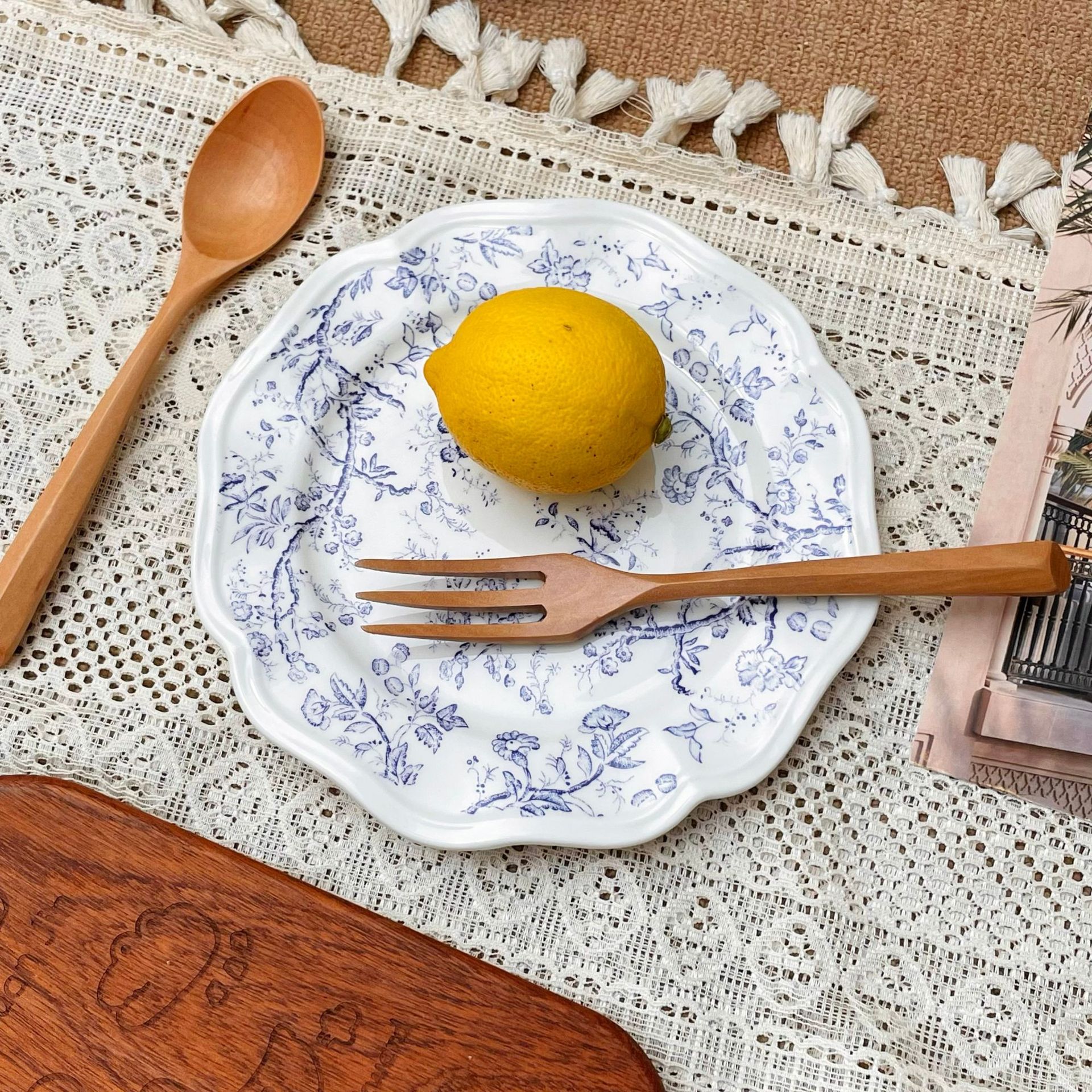 French-style retro blue relief ceramic plate for restaurant kitchen, high appearance level, lace-shaped dessert photo breakfast plate Application Scenario