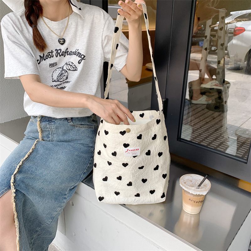36252 New textured heart-shaped canvas single-shoulder backpack, large-capacity handbag, makeup bag, student underarm bag Specification drawing