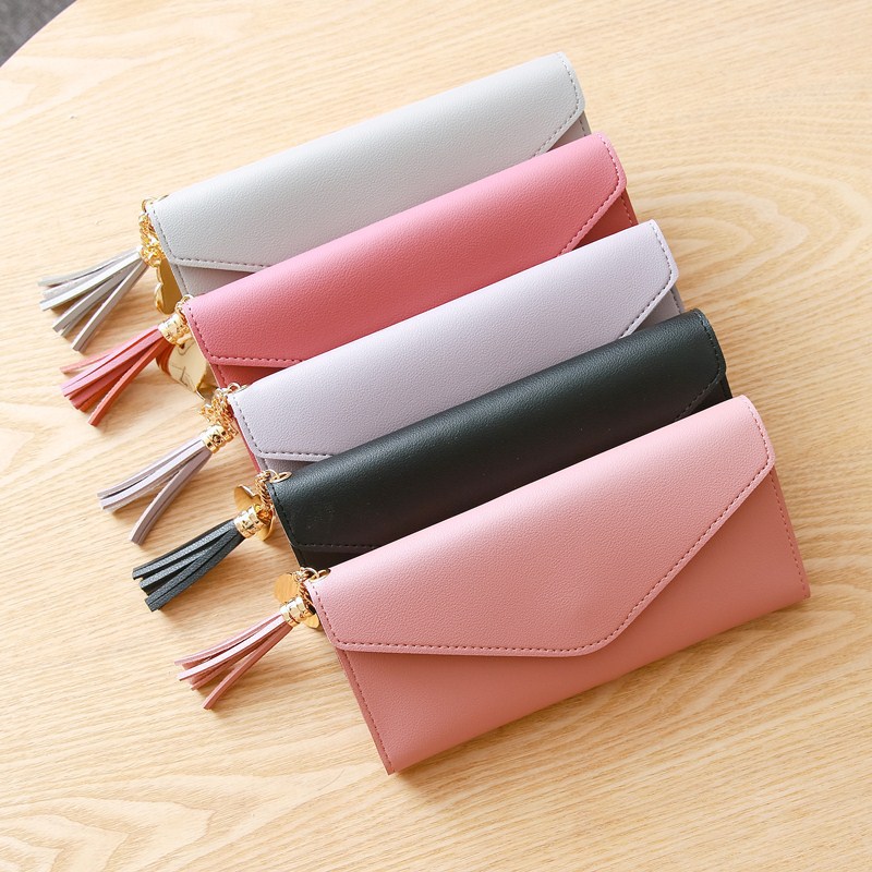 2018 Spring/Summer new long hand-held trendy heart-shaped pendant, simple, fashionable and multi-functional women's wallet with lychee pattern Item Picture