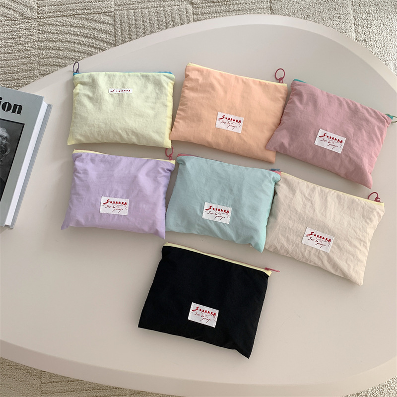 37161 Korean niche design ice cream colored cosmetic bag, small item storage bag, letter clutch, coin purse full figure