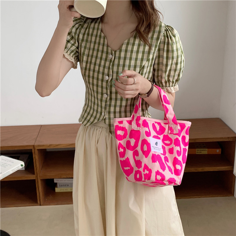 1541 Stylish pink leopard print large-capacity tote bag, animal print single-shoulder bag, handbag for female students, 2021 new Trend Application Scenario
