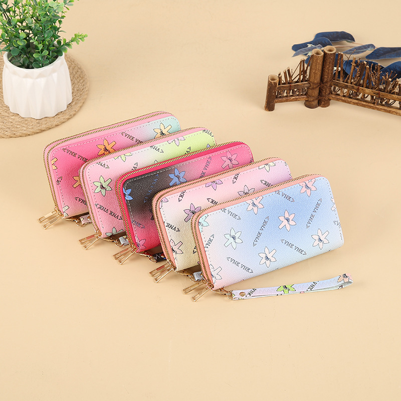 Wholesale of new long double-zipper clutch bags for women, fashionable wallets, large-capacity soft leather wallets, card holders and mobile phone cases full figure