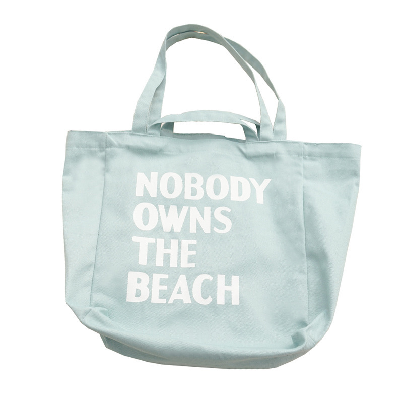 E132 Korean version artistic and simple letter single-shoulder canvas bag for female students, large-capacity hand-held shopping bag for sourcing Item Picture