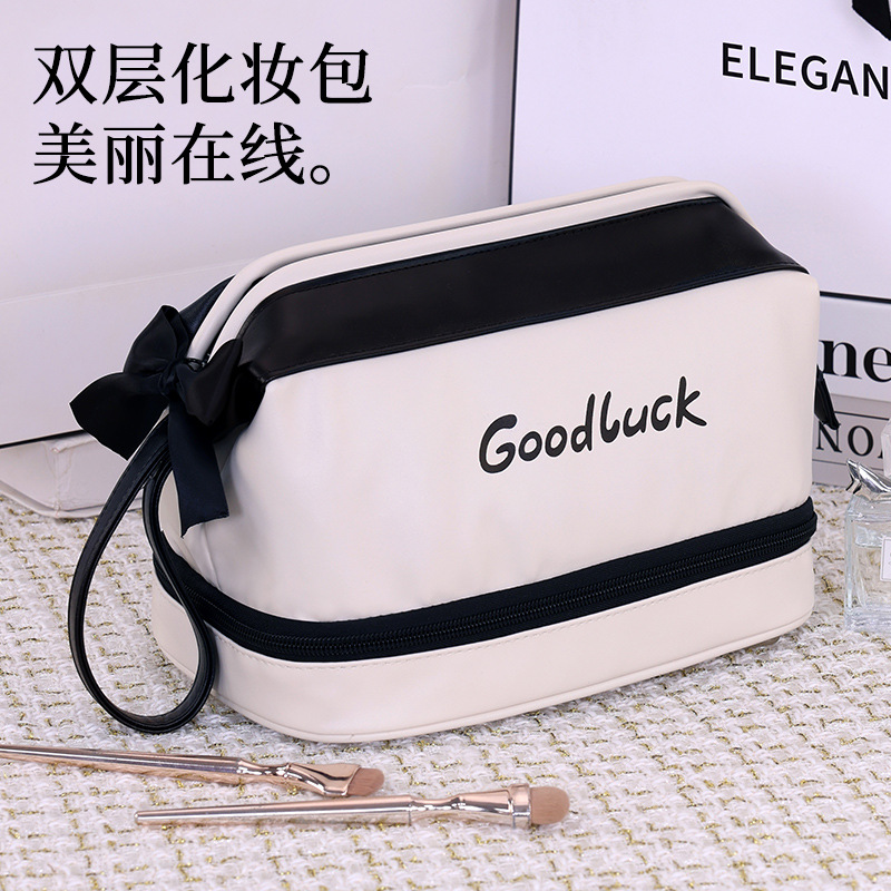 A light luxury and high-end double-layer makeup bag with a small fragrance style, a popular travel portable cosmetics storage bag and makeup bag full figure