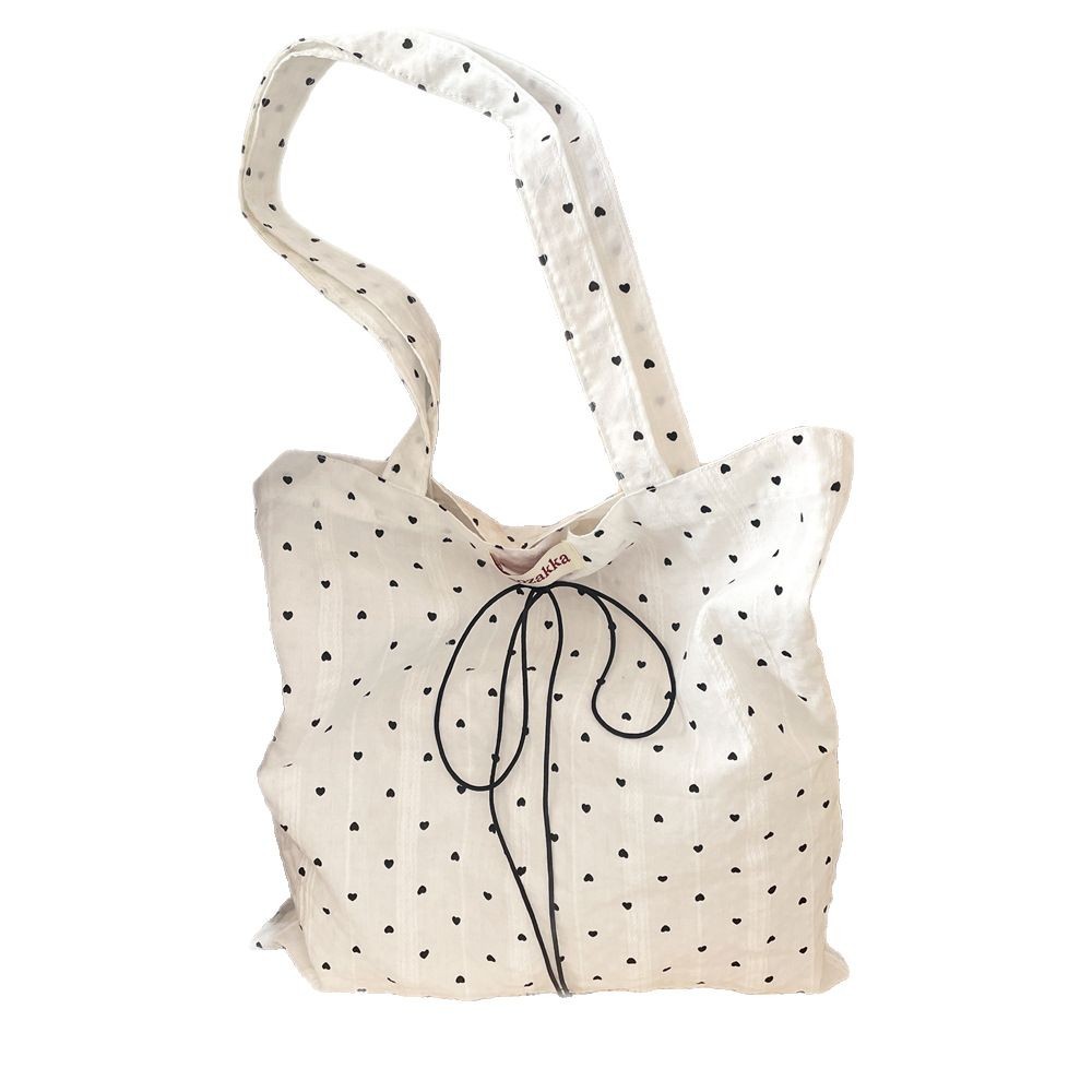 53254 Korean-style laid-back little heart canvas bag, 2025 new single-shoulder tote bag, commuter underarm bag for women Item Picture