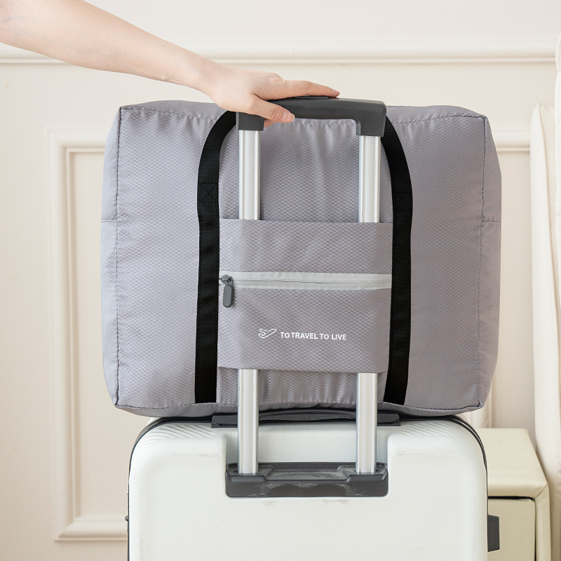 Cross-border folding travel storage bag, large-capacity business trip hand-held portable luggage bag, multi-functional diamond-shaped grid moving bag full figure