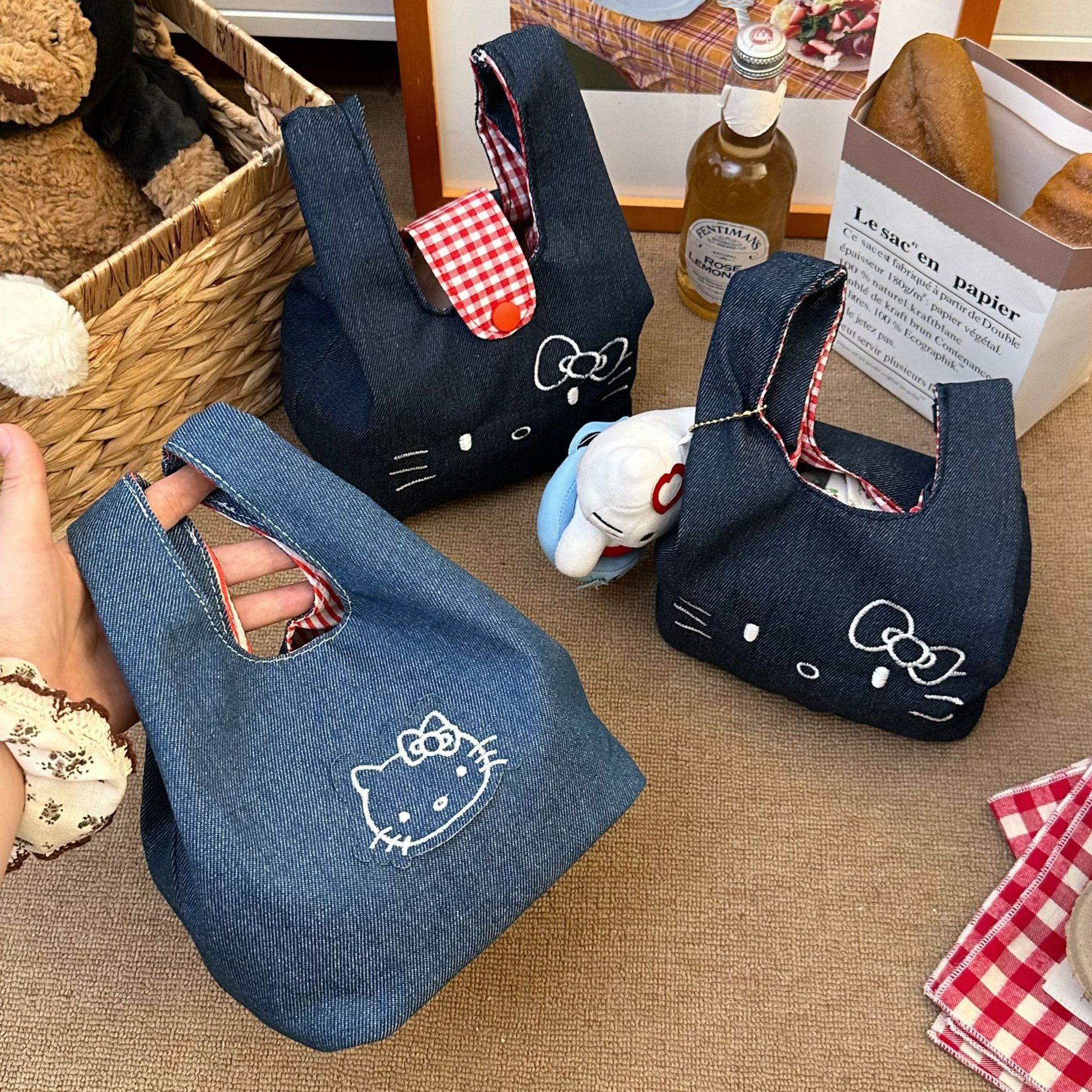 New cat-shaped denim wrist bag, cute embroidered handbag, portable large-capacity hand-held cosmetic storage bag details Picture