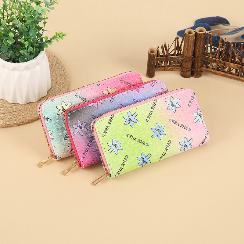 Wholesale of 2023 new style fashionable clutch bags with large capacity zipper, ladies' wallets, card cases, mobile phone cases and wallets from the manufacturer details Picture