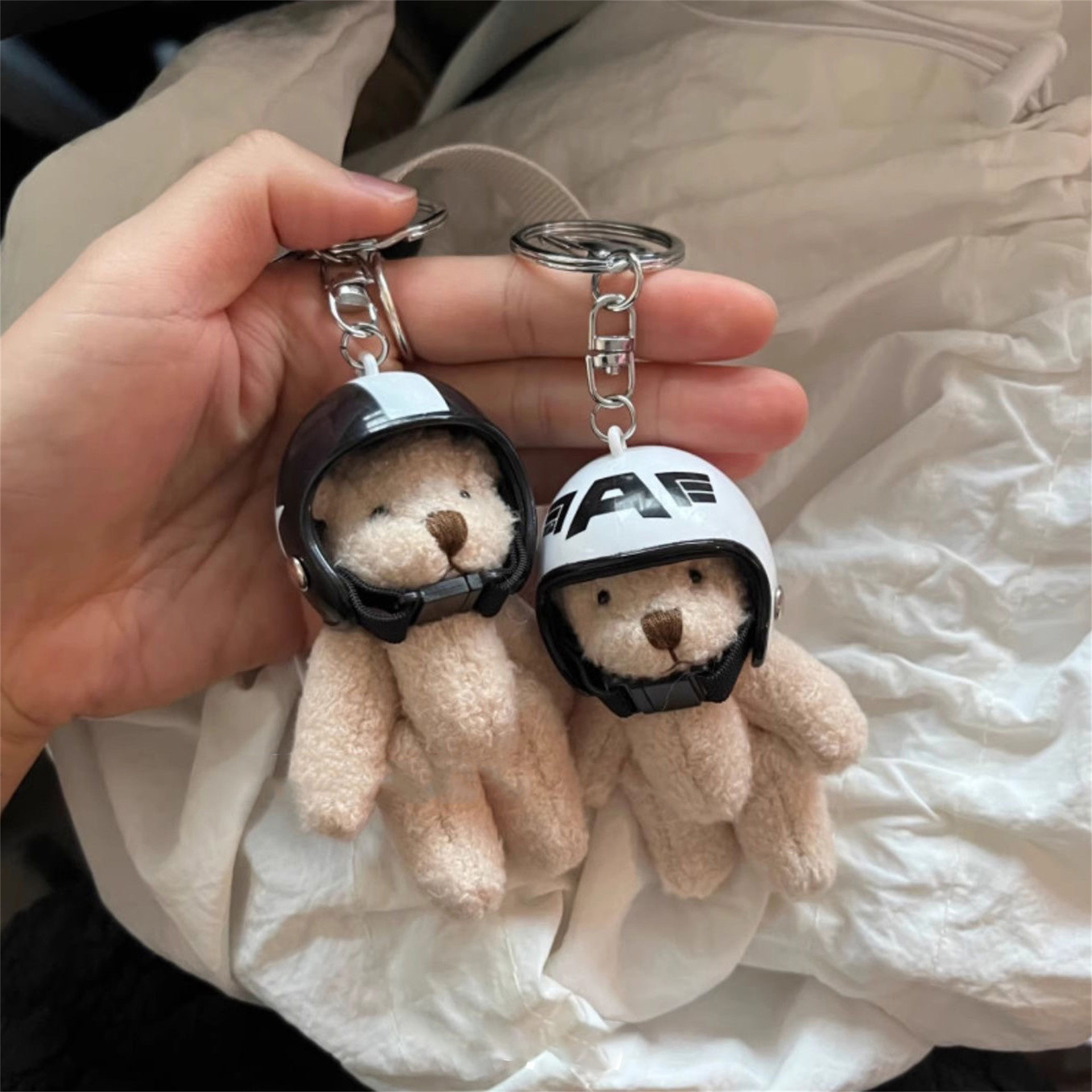Motorcycle helmet, teddy bear plush pendant, Korean Instagram fan, niche keychain, couple bag pendant full figure