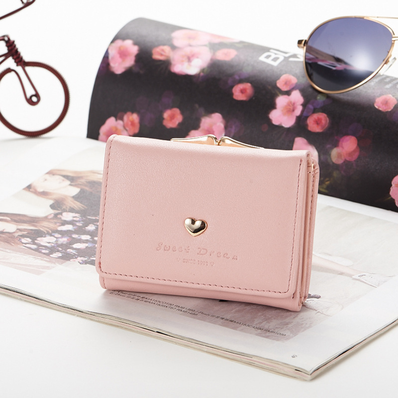 Factory direct sales 2021 New style women's wallet with Korean buckle, large capacity soft surface hand-held women's loose change card case Application Scenario