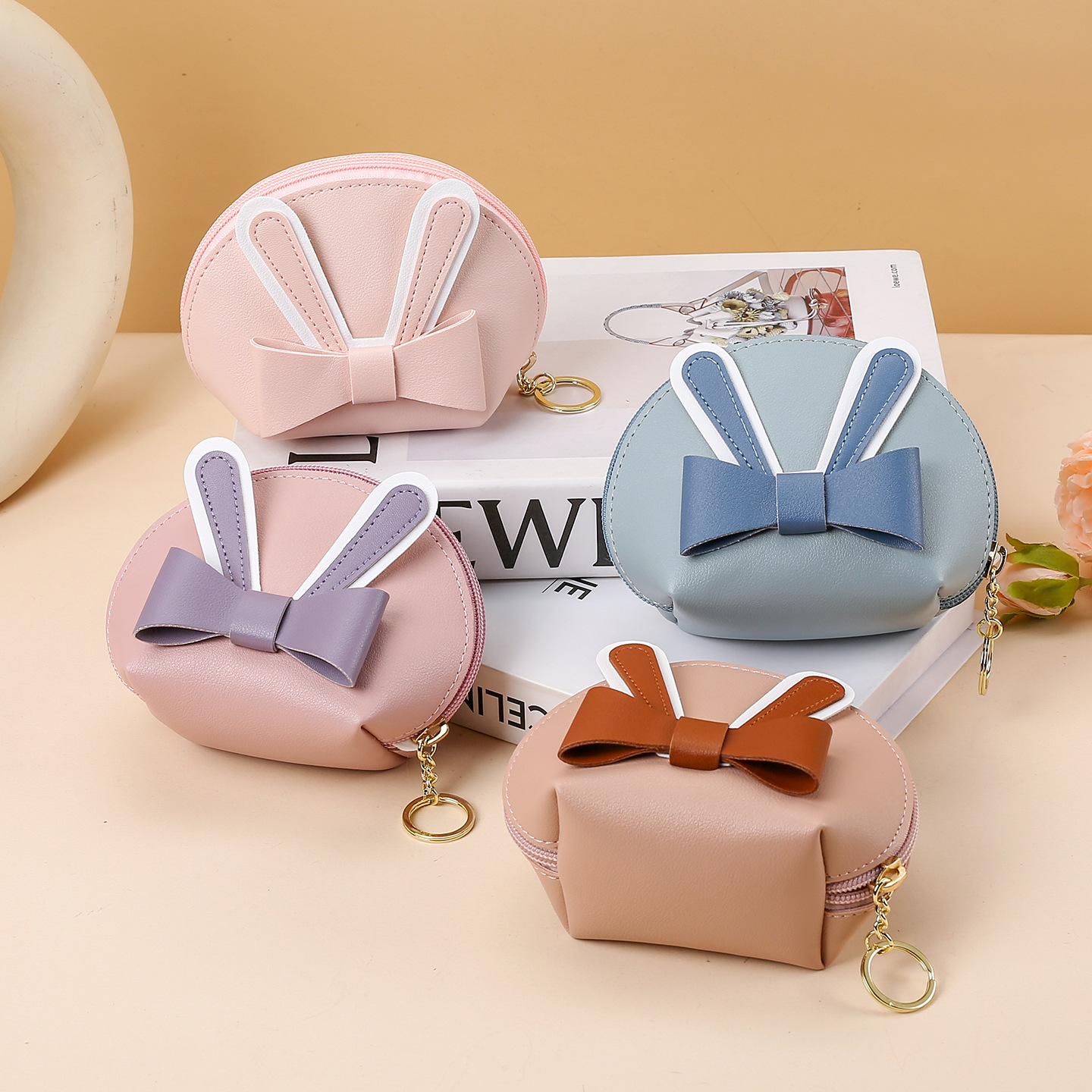 New Shangtu ear bow coin purse, pu leather earphone case, card case, keychain, zipper short gift full figure