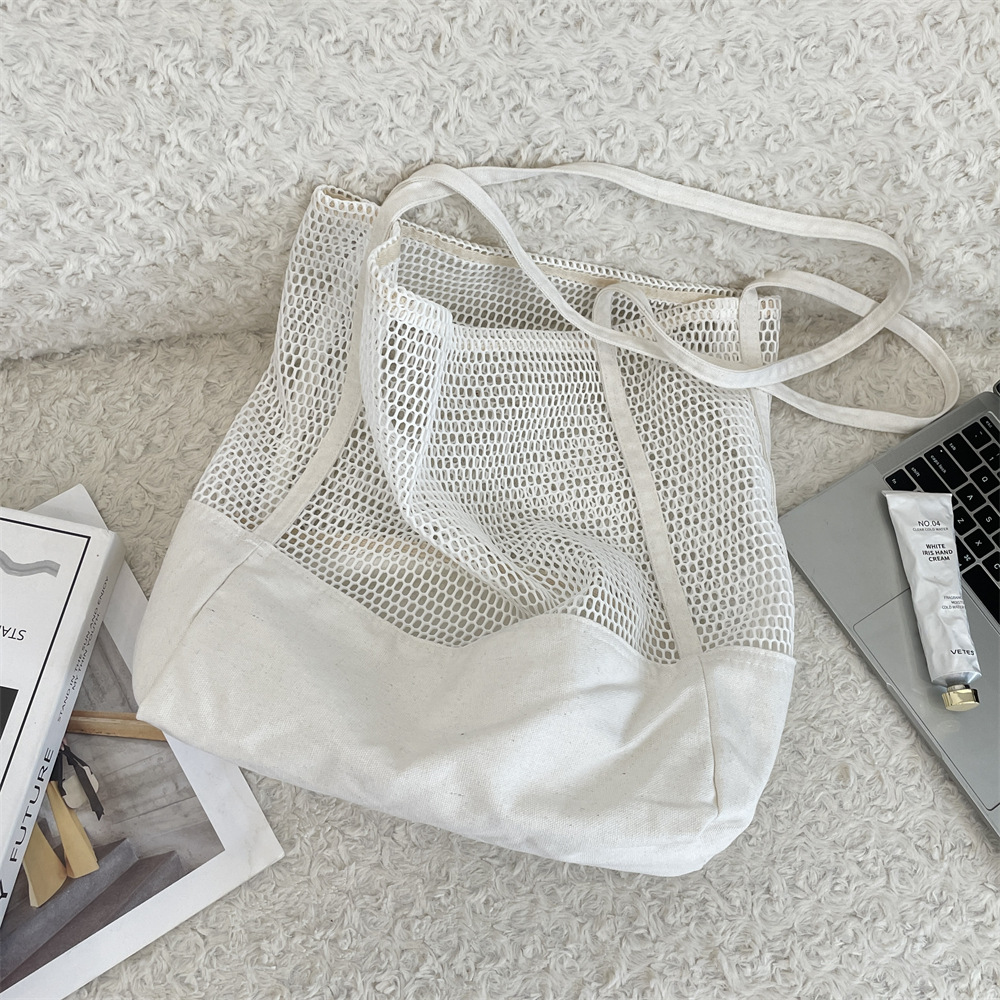 55211 Solid color hollowed-out large-capacity tote bag, mesh travel beach bag, single-shoulder bag, canvas shopping bag for women details Picture