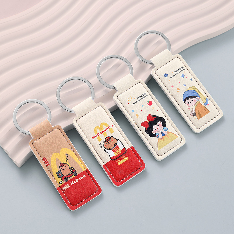 The new PU leather car keychain has a good meaning. The anti-loss keychain ring can be embossed with the logo. Leather key chain batch full figure