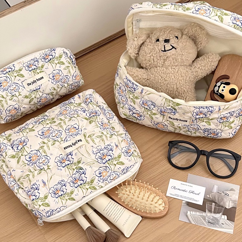 New blue fairy flower makeup bag, a girlish heart handbag, a portable toiletry bag and storage bag for traveling full figure