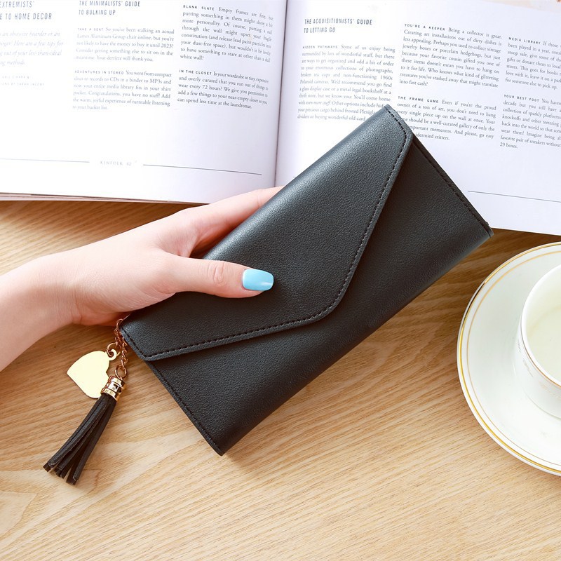 2018 Spring/Summer new long hand-held trendy heart-shaped pendant, simple, fashionable and multi-functional women's wallet with lychee pattern Application Scenario