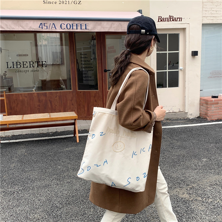 【 In Stock 】110182 Korean canvas bag, women's embroidered hello letter printed single-shoulder bag, simple and large capacity Item Picture