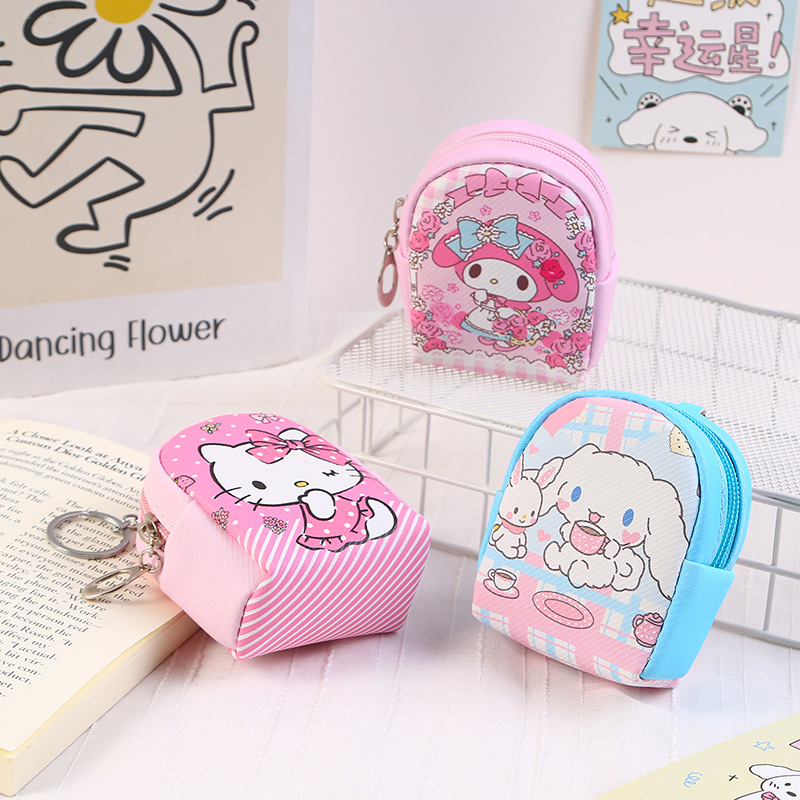 This coin purse is cute and small in an ins style. It can be hung on a schoolbag with a cartoon creative design. It is a mini earphone and key storage bag details Picture