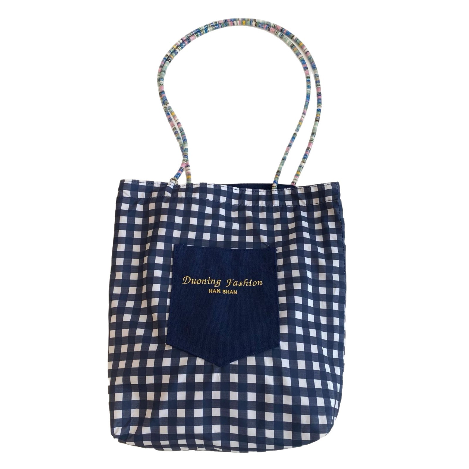 This retro checkered canvas bag is versatile for commuting. The tote bag can be used on both sides. It is a popular women's bag that can be carried by hand or underarm Item Picture