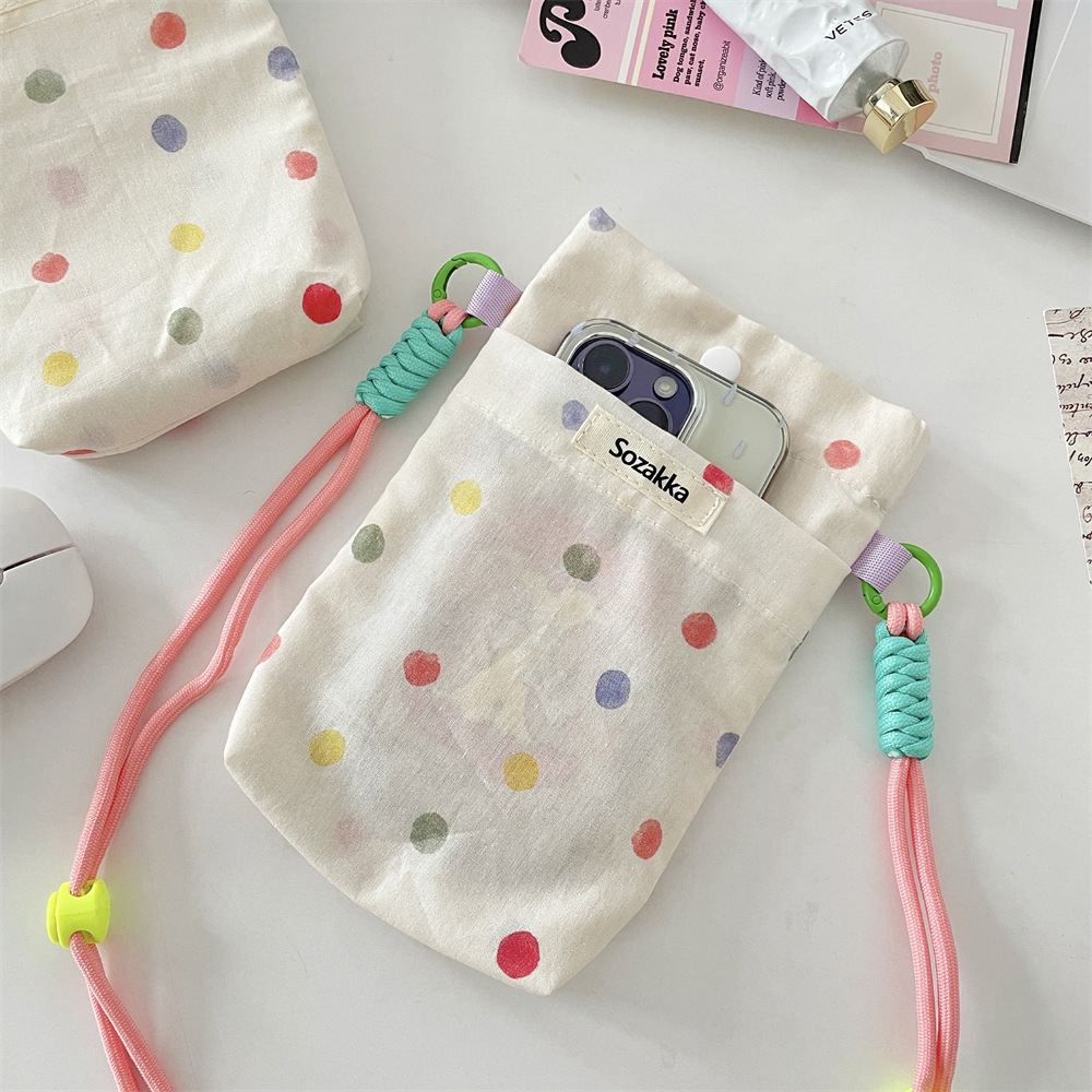 54113 Color polka dot lanyard mobile phone case, new style, portable mobile phone storage, hand-held miscellaneous coin purse for women Application Scenario