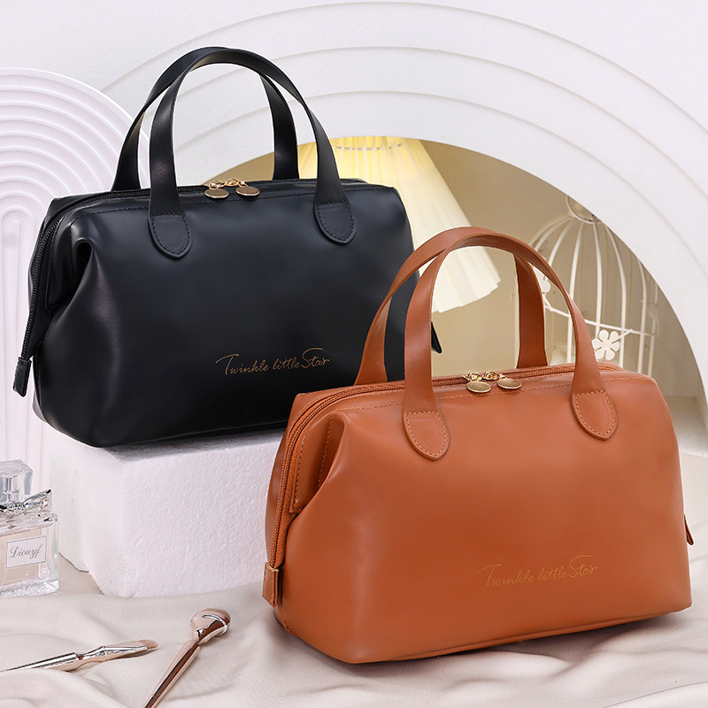 New large-capacity, high-appearance, high-end makeup bag, large French portable PU storage, commuting cosmetics, fashionable full figure