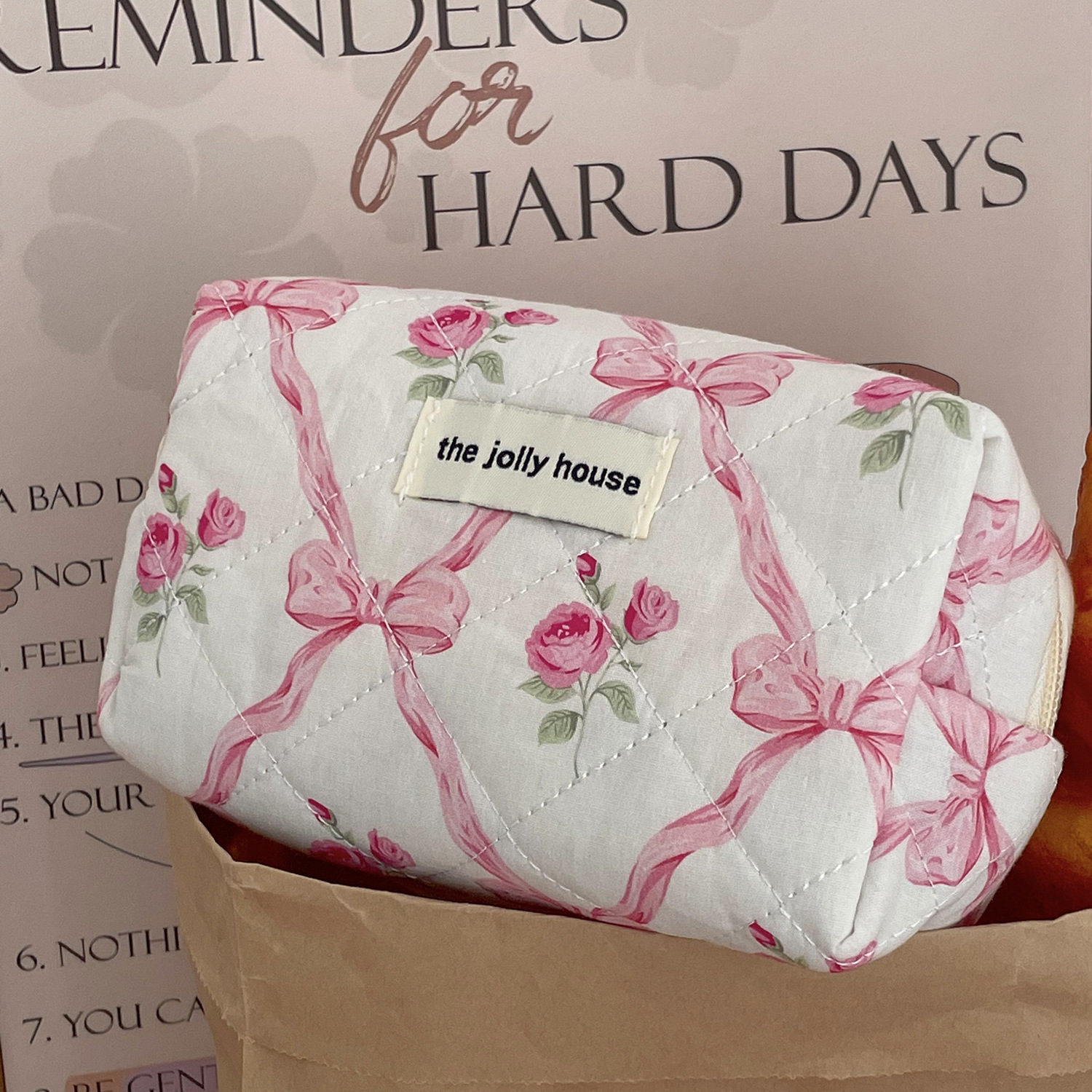 Bow flower storage bag, court-style retro soft and fluffy toiletries bag, quilted soft and shockproof, cute octagonal bag Application Scenario