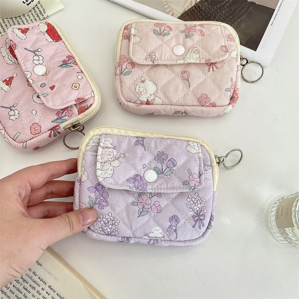 412221 Cute cartoon floral quilted multi-functional storage bag, organizing bag, ID bag, coin purse and card case Application Scenario