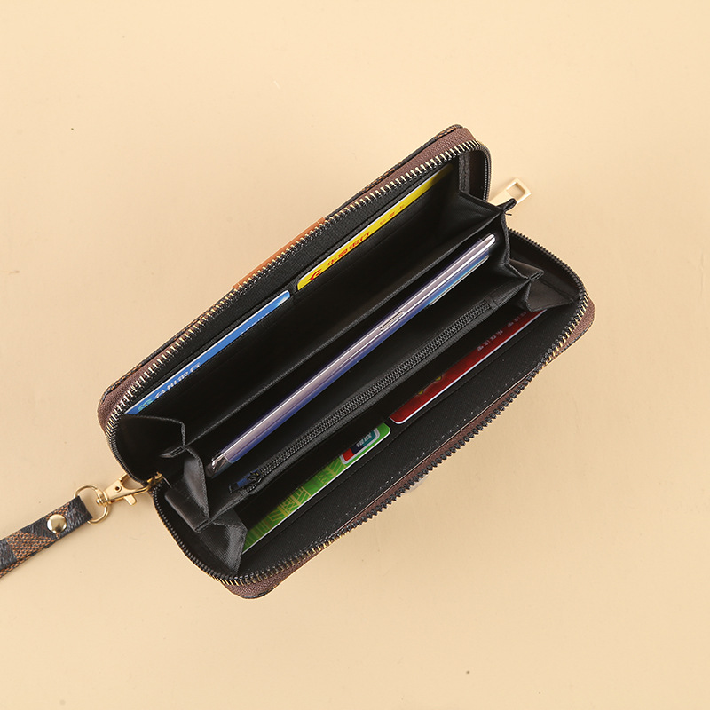 The new wallet features a large-capacity hand-held bag with leather and is portable and customizable. It can be customized with a logo Specification drawing