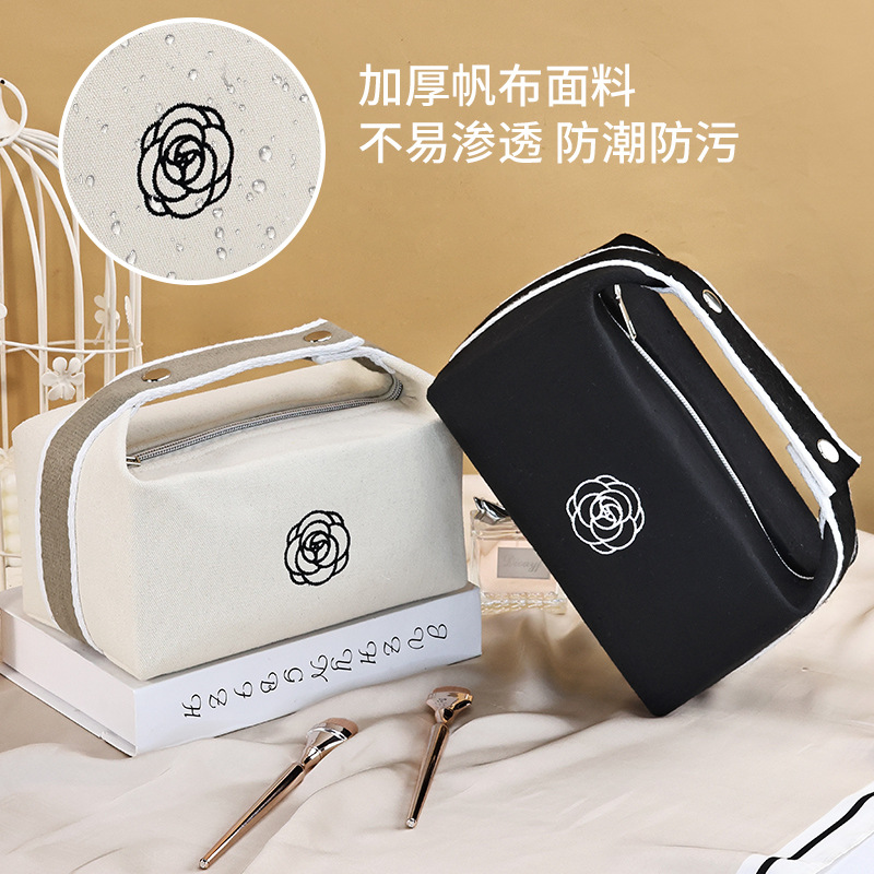 Portable canvas hand-held makeup bag, new high-end camellia lipstick, mobile phone, watch, key, travel storage bag Application Scenario