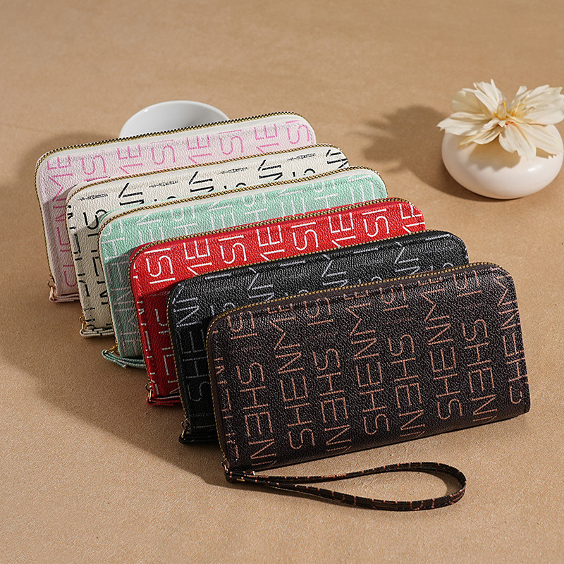A new Korean-style ladies' wrist wallet with a long zipper and a high-end feel, featuring multiple slots for cross-border mobile phone cases Specification drawing
