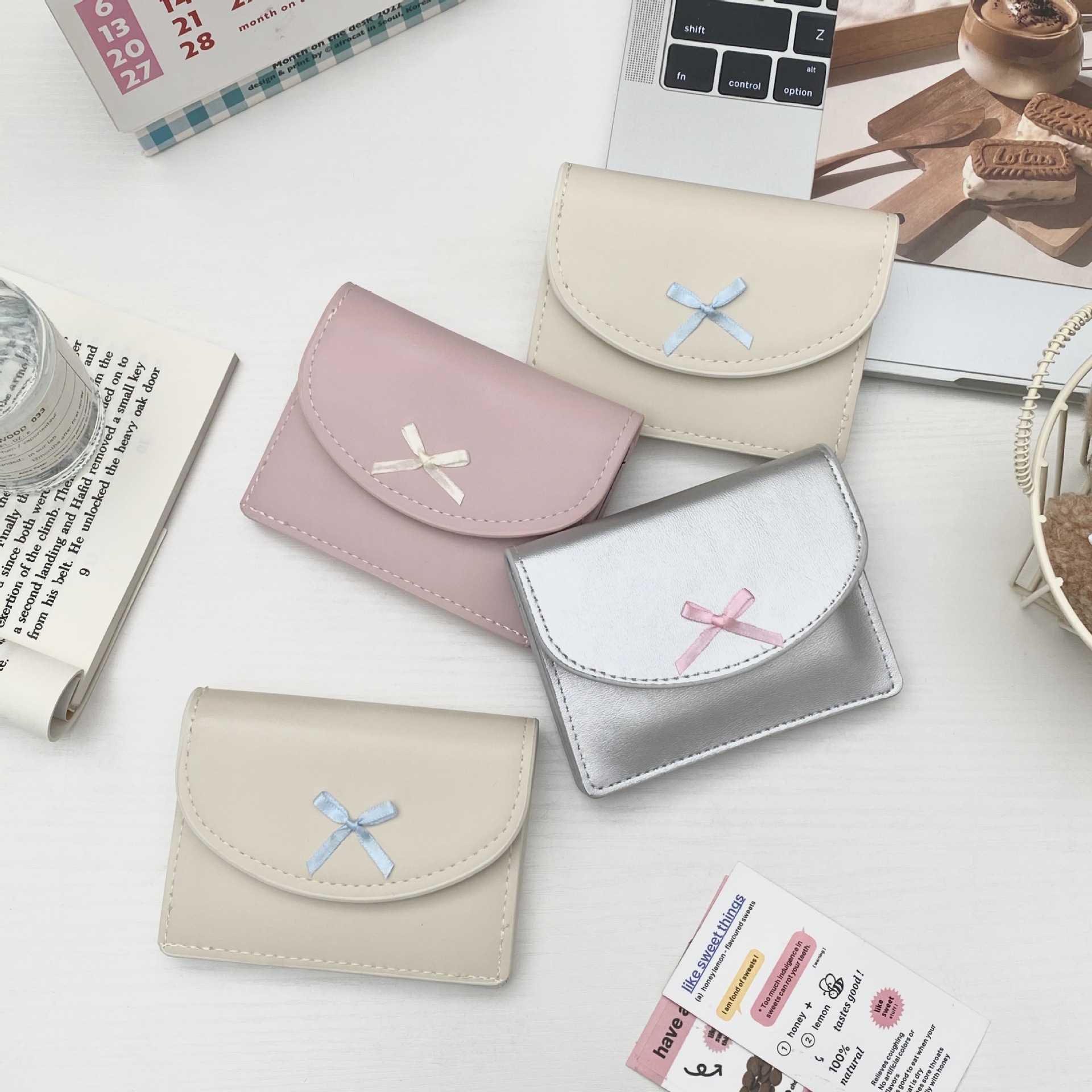 Cross-border Korean version simple coin purse, large-capacity portable, girls' bow card holder, mini hand-held loose change card case full figure