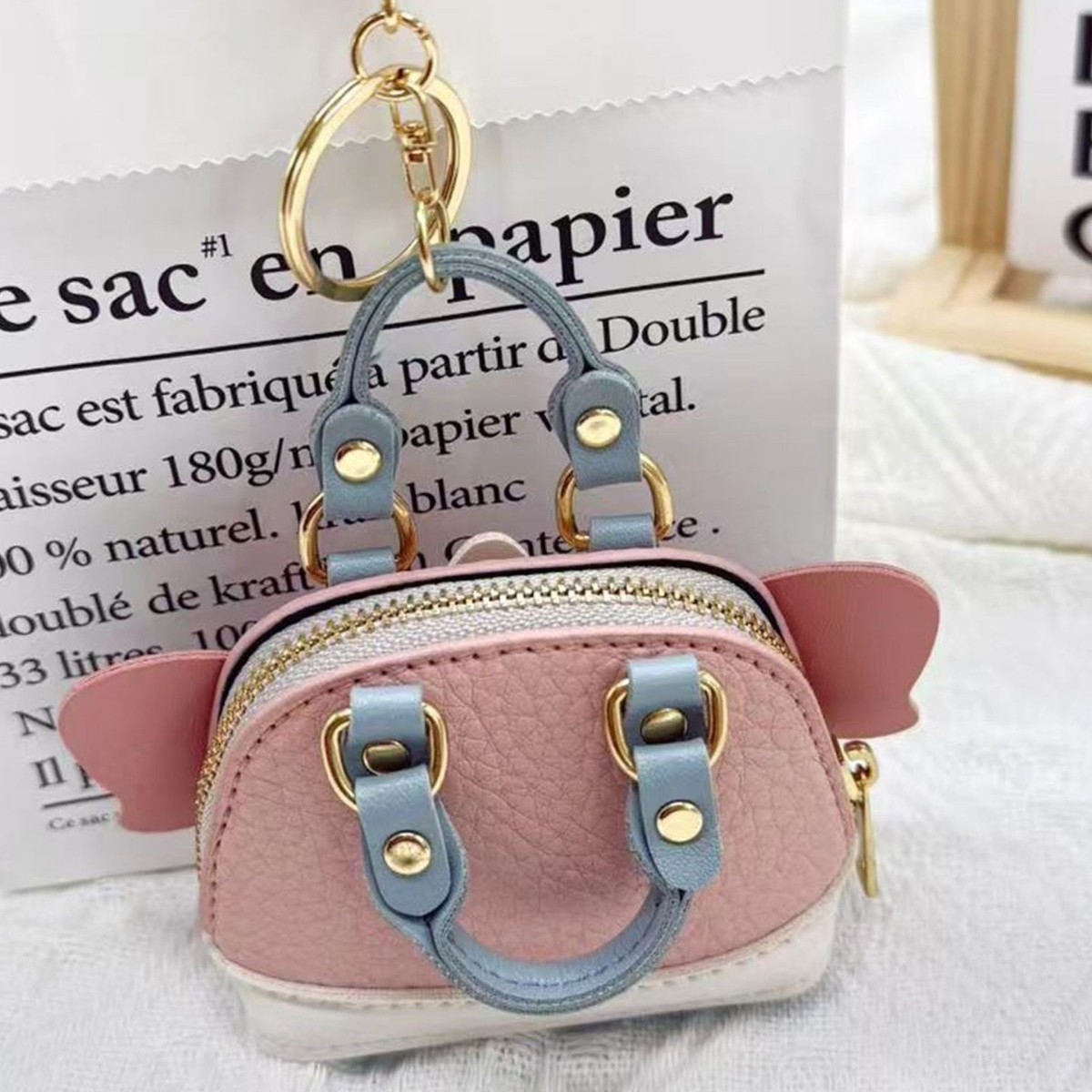 Mini pink elephant bag, the same style as Xiaohongshu puppy and elephant earphone case, mini coin purse, red envelope for women Item Picture