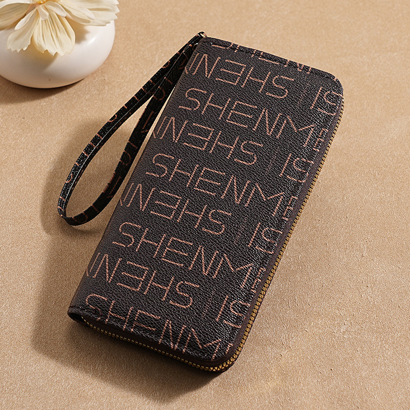 A new Korean-style ladies' wrist wallet with a long zipper and a high-end feel, featuring multiple slots for cross-border mobile phone cases full figure