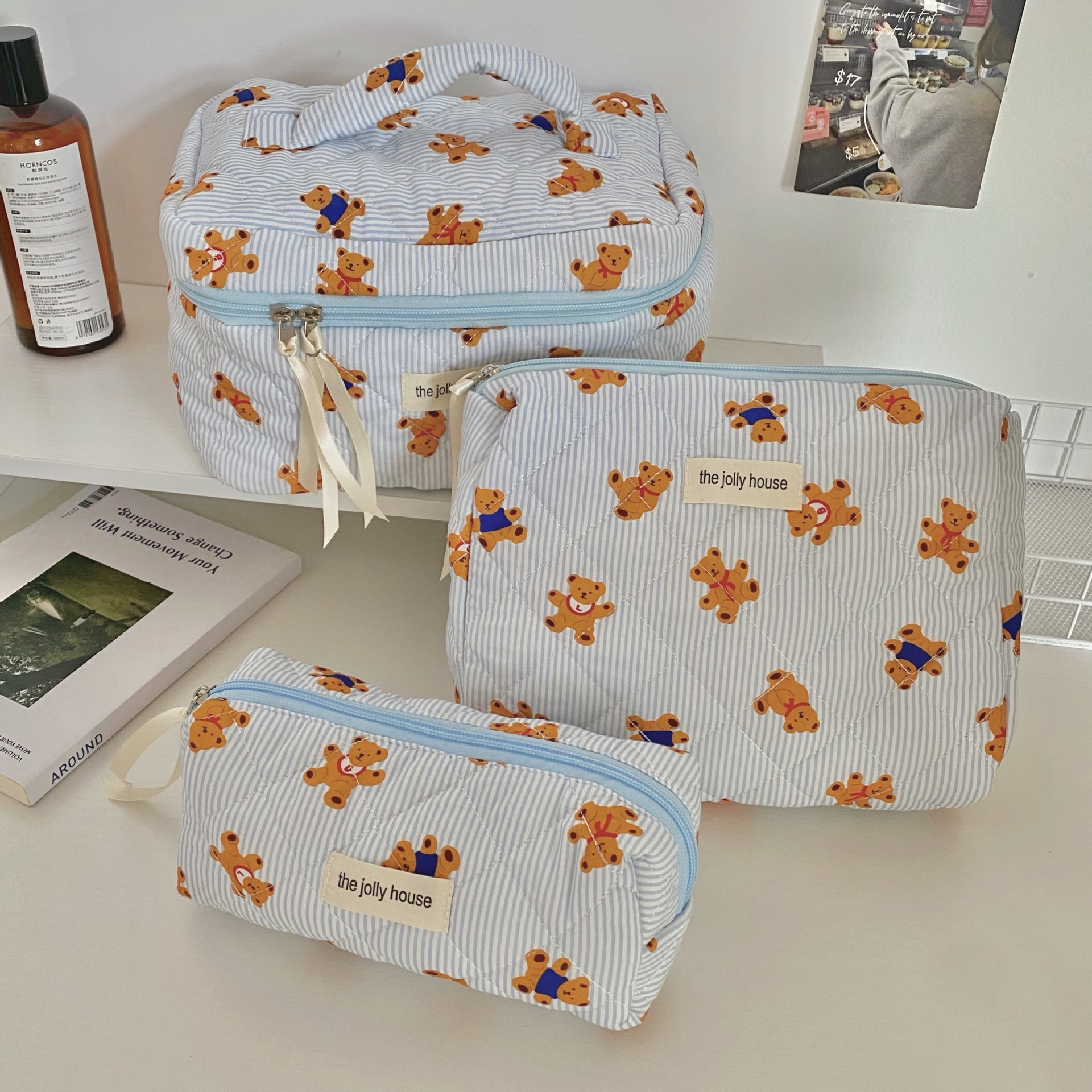 Cross-border blue striped bear makeup bag, large-capacity, high-end portable cosmetics storage bag, storage bag full figure