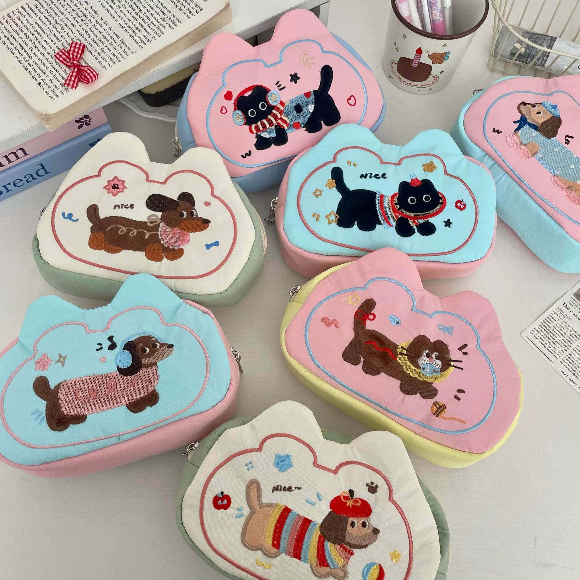 Cute little dog embroidered pen case 2025 new style, large capacity, high appearance level, student pencil case, stationery bag, storage bag for girls full figure