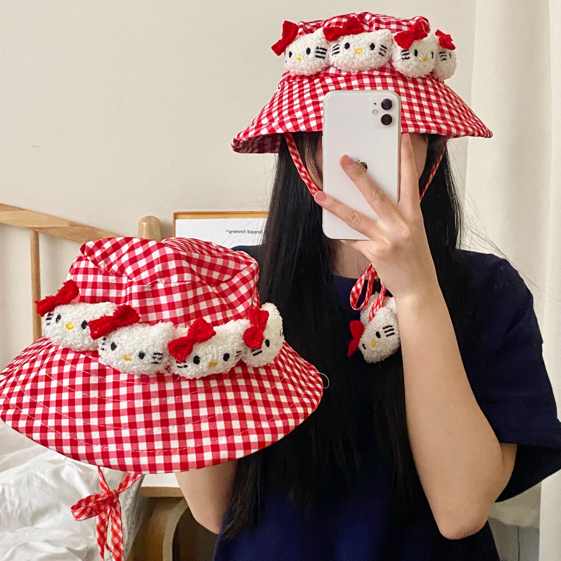 A cute Japanese red checkered fisherman's hat with a wide brim, a cat hat, a sweet beach picnic fisherman's hat, and a windproof hat full figure