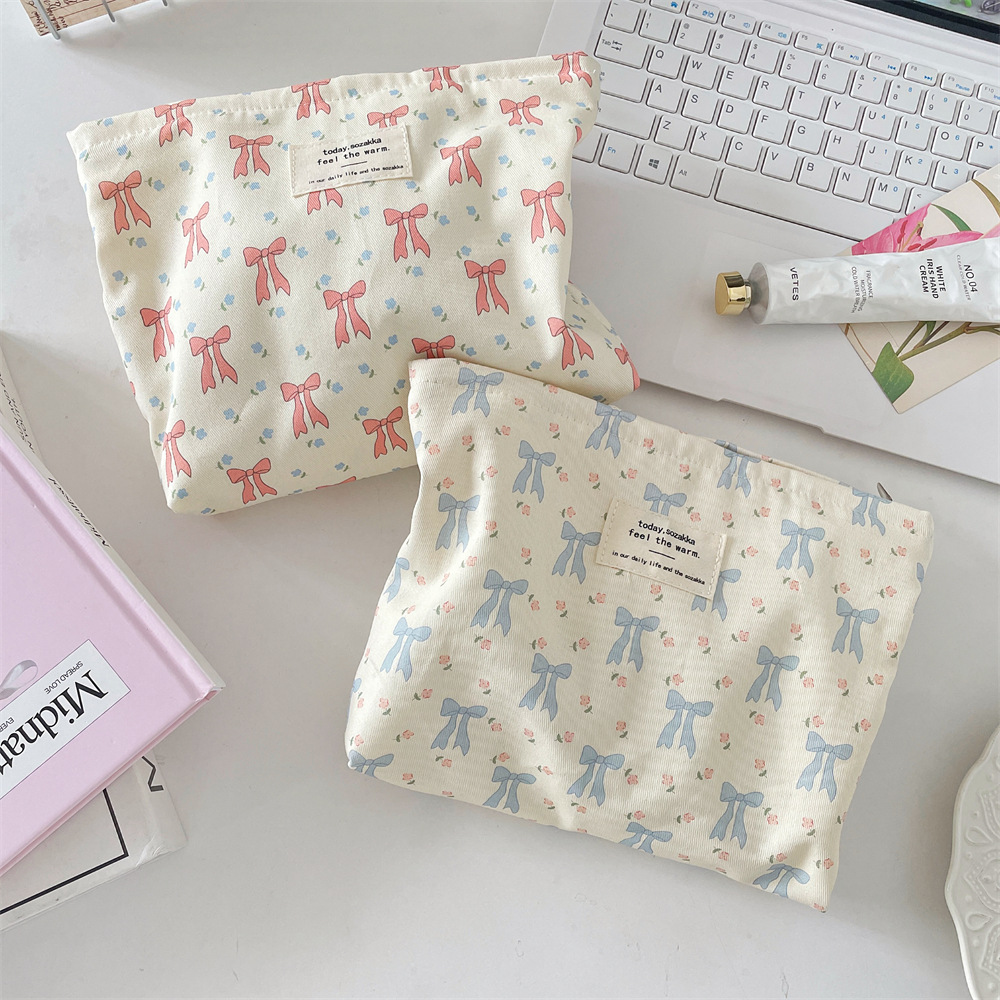5622 Cosmetic bag with printed bow, portable skin care products storage, fabric small square bag, coin purse, and miscellaneous organization full figure