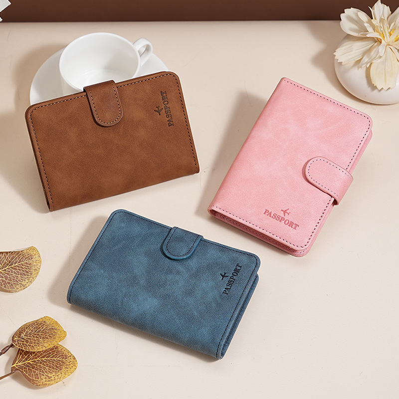 2023 New RFID passport simple buckle short passport bag for men and women, air ticket card holder for overseas travel details Picture